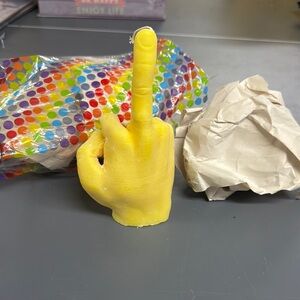 Yellow Hand Gesture Sculpture